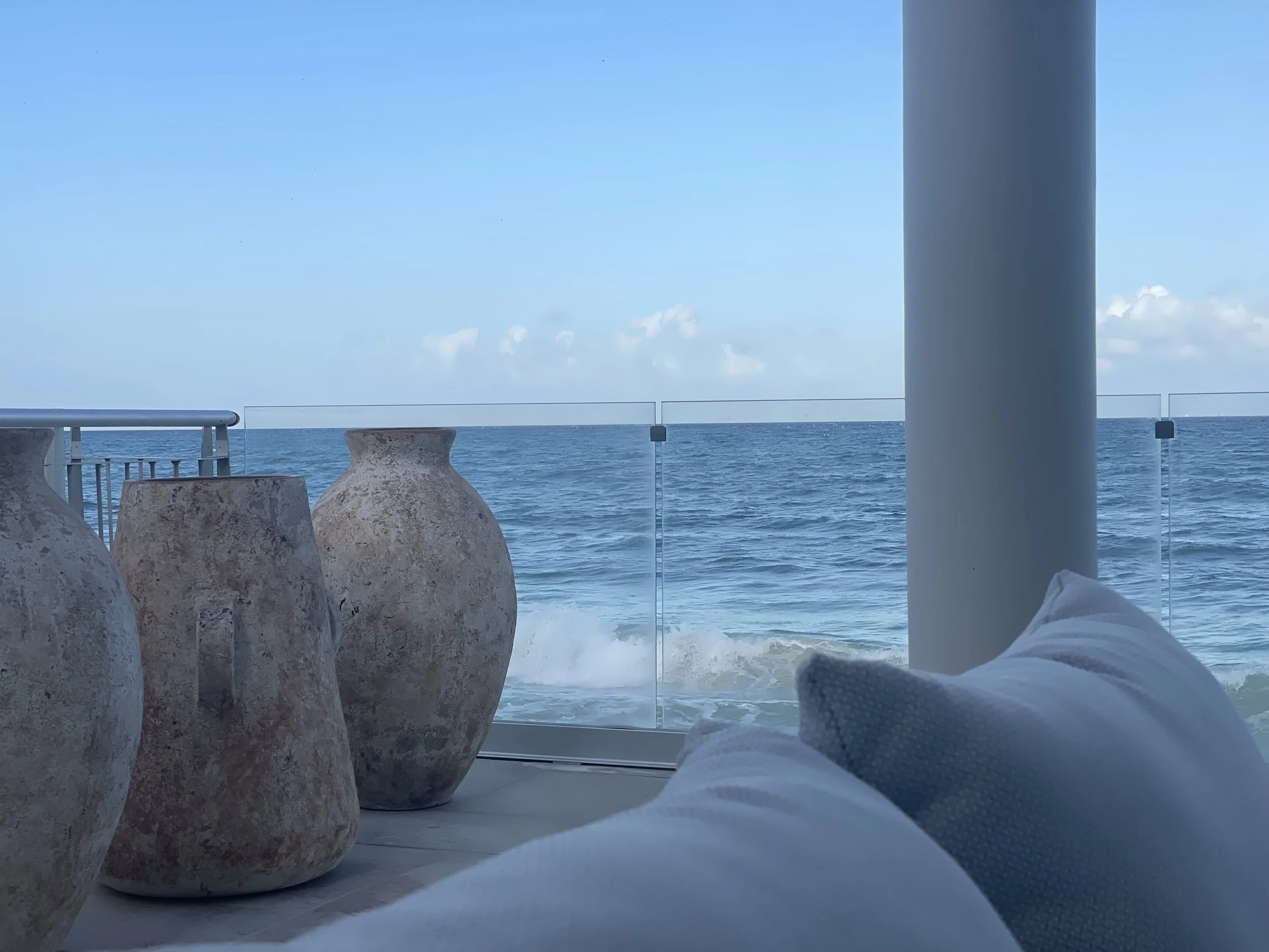 Terrace view of turquoise water before arrival